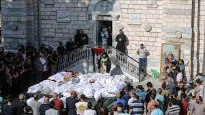 مطران غزة يقيم صلاة الجنازة على شهداء غزة المسيحيين في قصف قوات الاحتلال كنيسة القديس برفيريوس في غزة